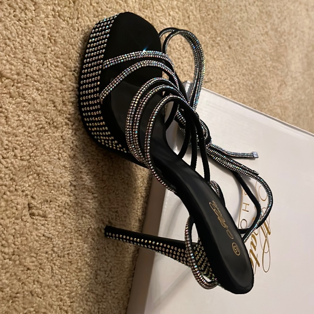 New, never worn black platform heels with sequins